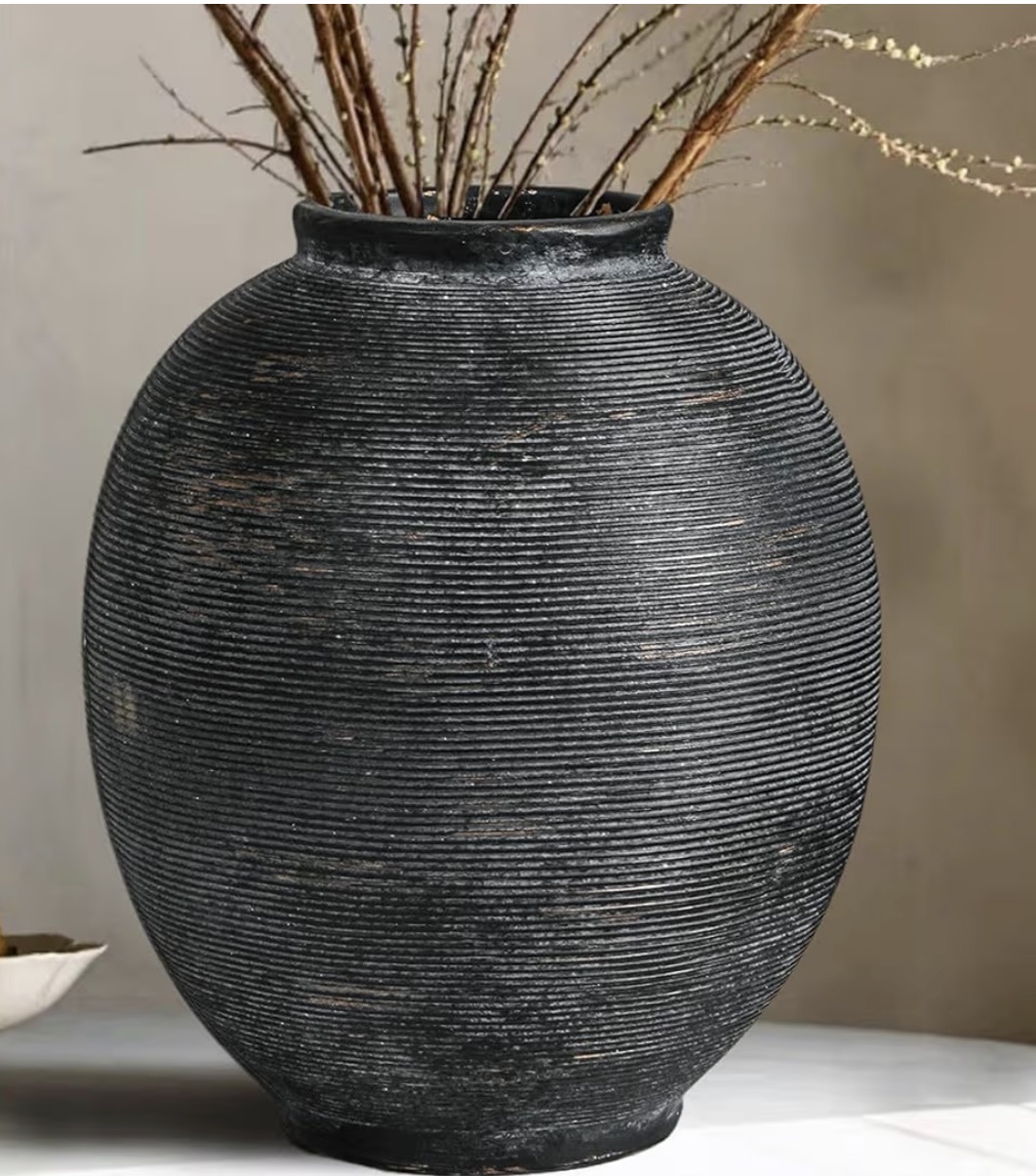 Matte black ceramic vase with organic silhouette
